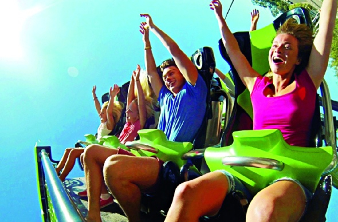 Kids on theme park ride