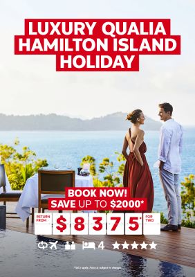Luxury Qualia Hamilton Island holiday | book now! - Save up to $2,000* | return from $8,375* for two. Couple in formal clothing sharing wine at a table overlooking the ocean