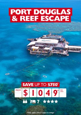 Port Douglas & Reef Escape - save up to $750* from $1,049* for two. Wide shot of a pier for a yacht and several coral reef snorkelling platforms