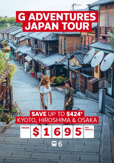 G Adventures Japan Tour. Save up to $424* | Kyoto, Hiroshima & Osaka from $1,695* per person. Two women walking through a secluded street in Kyoto