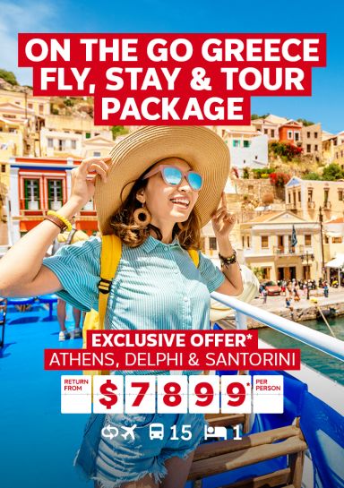 On The Go Greece fly, stay & tour package | exclusive offer* - Athens, Delphi & Santorini. Return from $7,899* per person | Woman with a wide-brimmed hat smiling looking out at Greece