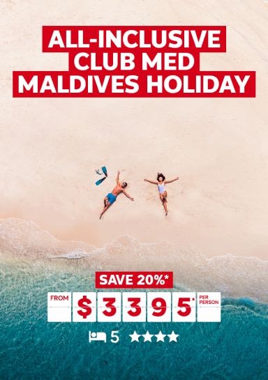 All-inclusive Club Med Maldives holiday | save 20%* - from $3,395* per person | top down shot of a couple relaxing on a beach