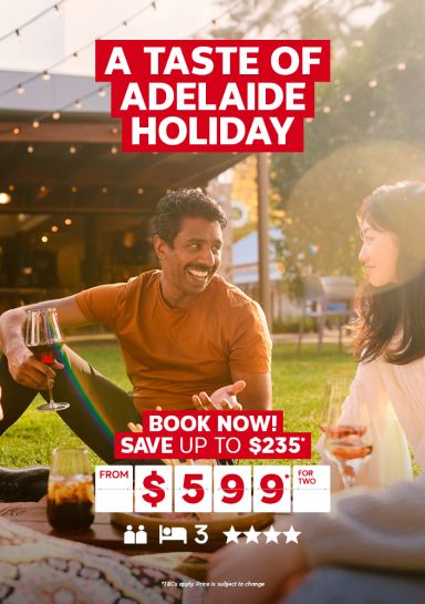 A taste of Adelaide holiday | book now! Save up to $235*. From $599* for two. Couple drinking wine on a blanket at sunset