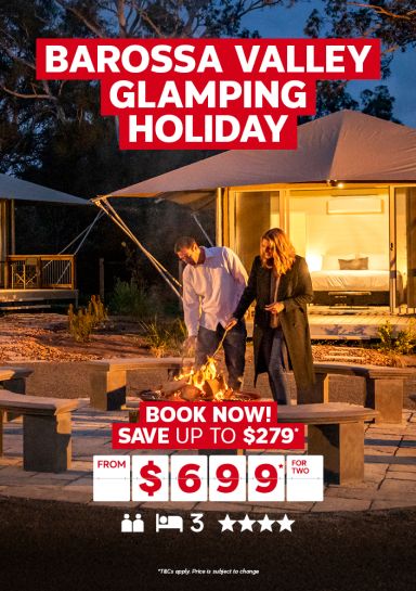 Barossa Valley glamping holiday - book now! Save up to $279* from $699* for two. Couple camping, warming up next to a fire