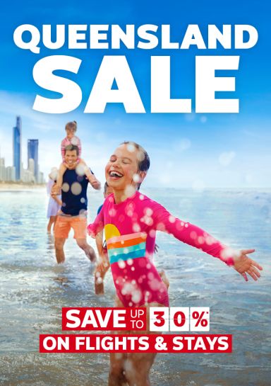 Queensland sale - save up to 30%* on Flights & Stays. Family playing in the surf on the Gold Coast