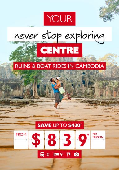 Your never stop exploring centre - Ruins & boat rides in Cambodia. Save up to $430* from $839* per person. Couple hugging in front of Angkor Wat in Cambodia
