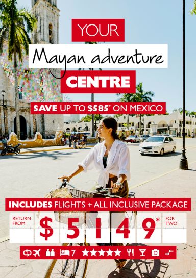 Your Mayan adventure centre - save up to $585* on Mexico. Includes flights + all-inclusive package return from $5,149* for two. Woman on a bike riding past a cathedral