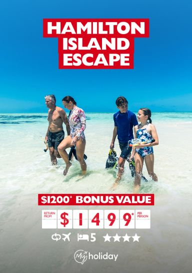 Hamilton Island escape. $1,200* bonus value | return from $1,499* per person. Family of four walking through the surf on a beach