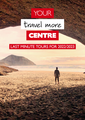 Your Travel More Centre - Last Minute Tours for 2022/2023 - Man standing on beach looking out at the sunset