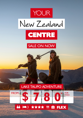 Your New Zealand Centre - Sale on Now. Two Woman carrying skis and a snowboard hiking up a slope at sunrise