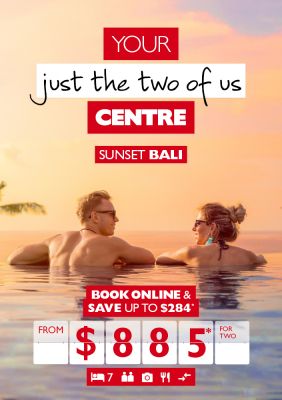 Couple in a pool while the sun sets