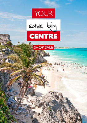 Your save big centre - tourists on a pristine beach with bright blue ocean and palm trees