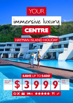 Your immersive luxury centre - Hayman Island holiday. Save up to $400* return from $3,999* for two. Couple walking holding hands past several hotel pools