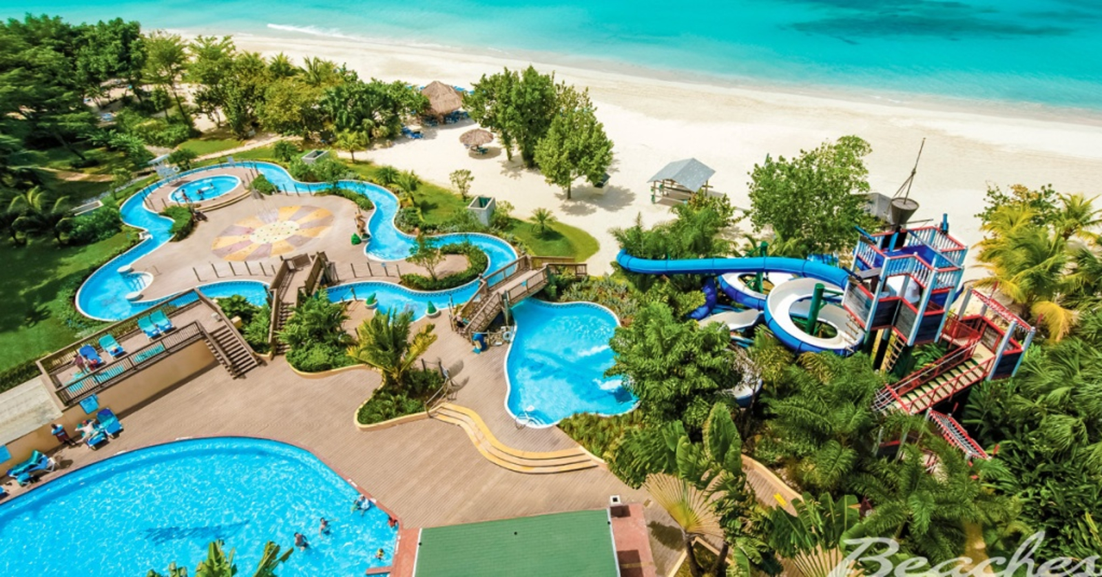 Top down view of a beach resort in Negril - water slides, lazy river, and lush scenery 