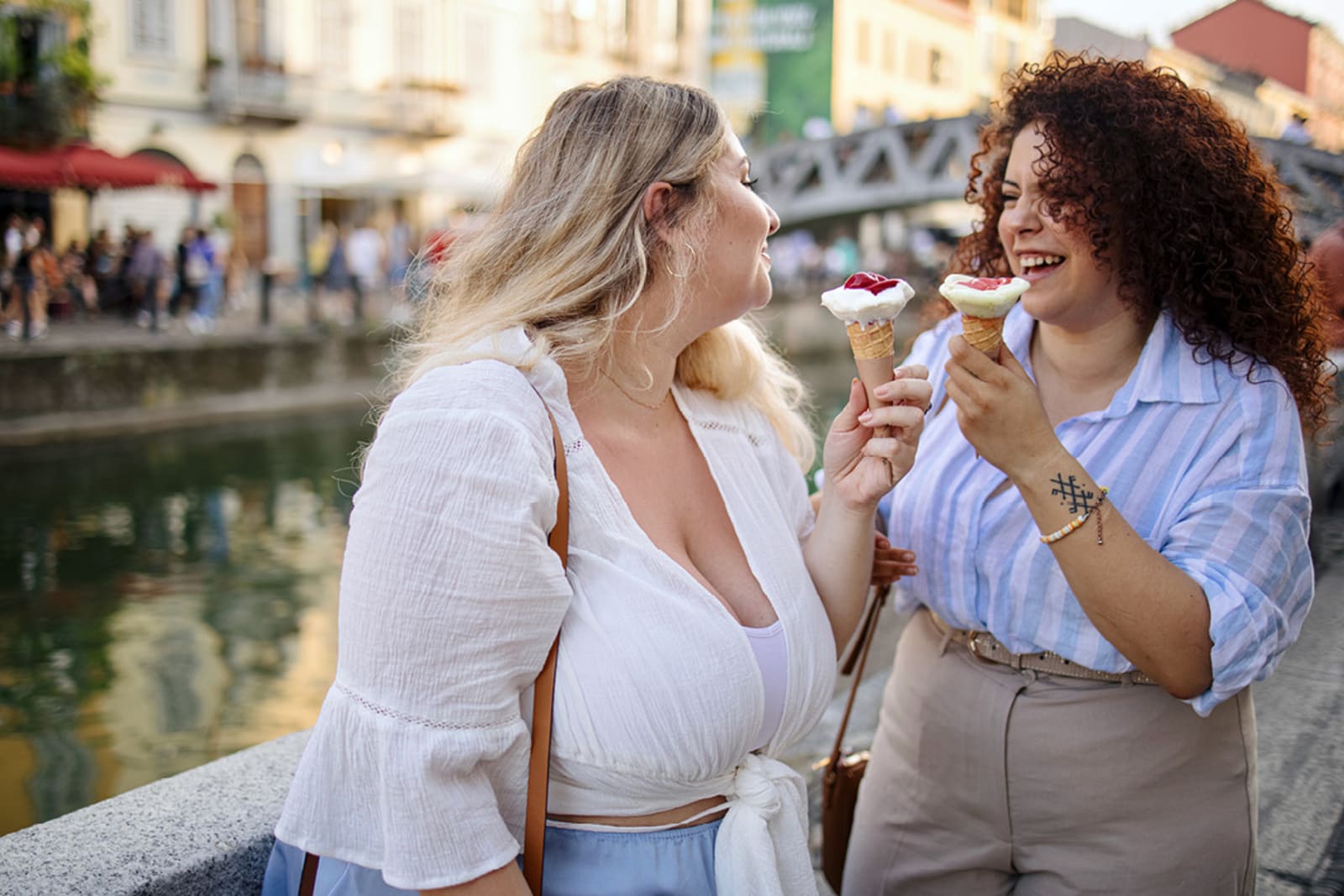 Two women eating gelato in Italy