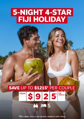 5-night 4-star Fiji holiday | save up to $1,215* per couple. From $925* per person | *T&Cs apply. Price is per person, based on twin share. | Two people drinking from coconuts