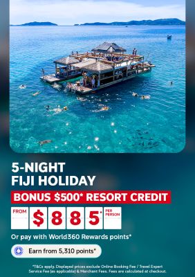 Swimmers around an overwater platform in clear Fiji lagoon waters for a 5 night Fiji holiday with 500 dollars bonus resort credit from 885 per person