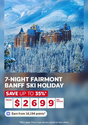 Fairmont Banff Springs castle nestled among snow covered pines for a 7-night ski holiday saving up to 35% from $2699 per person