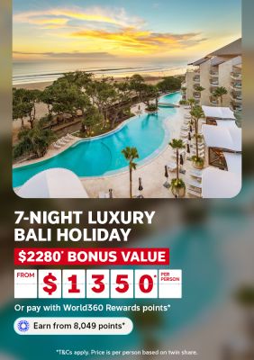 Sunset over resort pool and beach for a 7-night luxury Bali holiday with $2280 bonus value from $1350 per person