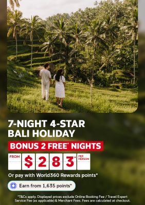 Couple walking hand in hand through lush palm tree rice terraces for a 7 night 4 star Bali holiday with 2 bonus nights from 283 per person