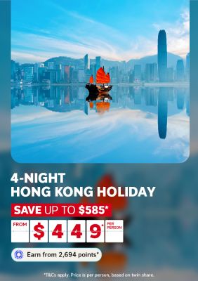 Red-sailed junk boat on mirror-still Victoria Harbour for a 4-night Hong Kong holiday saving up to $585 from $449 per person