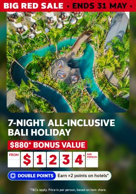 Winding tropical resort pool among lush Bali gardens and palm trees for a 7-night all-inclusive holiday with $880 bonus value from $1234 per person