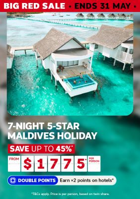 Couple in a plunge pool on an overwater bungalow above a turquoise Maldives lagoon for a 7-night 5-star holiday saving up to 45% from $1775 per person