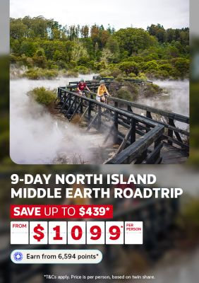 Cyclists crossing a misty geothermal boardwalk in New Zealand for a 9-day North Island Middle Earth Roadtrip saving up to $439 from $1099 per person