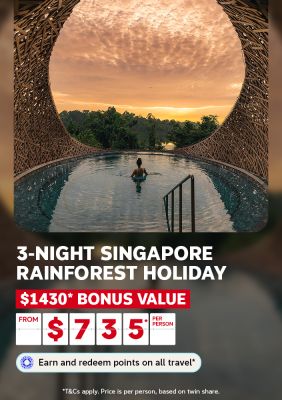 Person standing in a rainforest infinity pool framed by a woven circular arch at sunset for a 3-night Singapore rainforest holiday from $735 per person