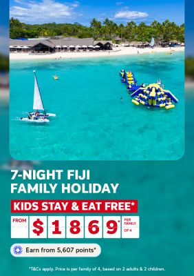 Catamaran and inflatable water park on a turquoise Fiji lagoon for a 7-night family holiday with kids stay and eat free from $1869 per family of 4
