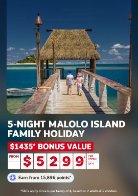Two children walking a timber jetty over turquoise Malolo Island waters for a 5-night family holiday with $1435 bonus value from $5299 per family of 4