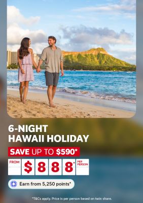 Couple walking hand in hand along Waikiki beach near Diamond Head for a 6-night Hawaii holiday saving up to 590 dollars from 888 per person