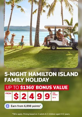Children running after a gold cart on a tropical island featuring a 5-night Hamilton Island family holiday from $2499 per family of 4