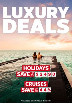 Couple relaxing in an infinity pool at sunset featuring Flight Centre Luxury Deals saving up to $2490 on holidays and 44% on cruises