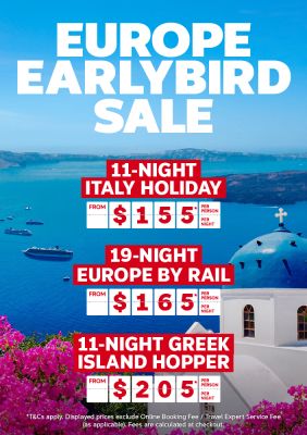 Wide shot of a cruise ship sailing past Santorini featuring Europe earlybird deals