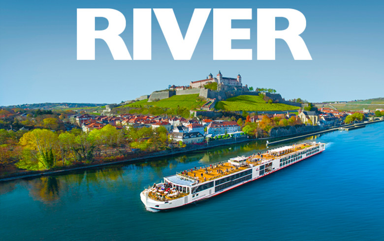 River | River cruise ship sailing past a castle on a hill