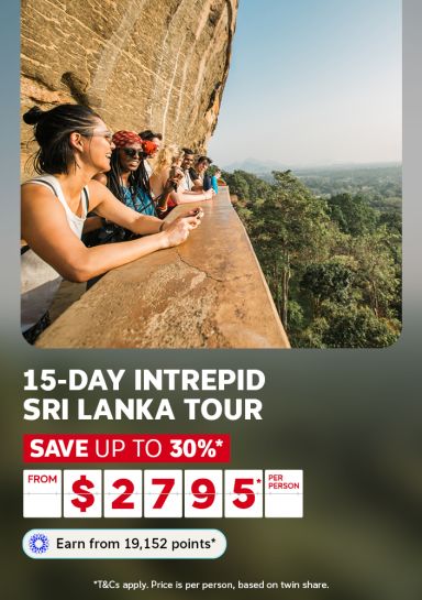 Travellers at Sigiriya Rock taking in sweeping Sri Lanka jungle views for a 15-day Intrepid tour saving up to 30% from $2795 per person