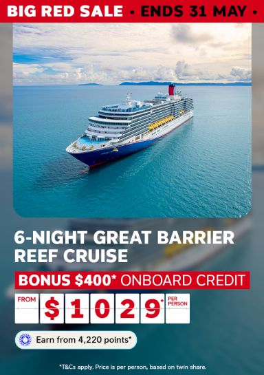 Cruise ship sailing turquoise Great Barrier Reef waters for a Big Red Sale 6-night cruise with bonus $400 onboard credit from $1029 per person