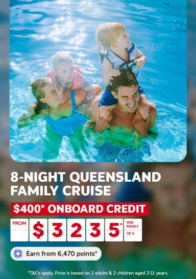 A travel promotional banner featuring a smiling family of four playing in a swimming pool. A woman in a blue swimsuit carries a young girl wearing a pink life jacket on her back, while a man carries a toddler in a blue life jacket on his shoulders. Both adults are smiling up at the children. Text below reads: "8-Night Queensland Family Cruise – $400* Onboard Credit – From $3,235* per family of 4. Earn from 6,470 points*." Fine print states: "T&Cs apply. Price is based on 2 adults & 2 children aged 2–11 year