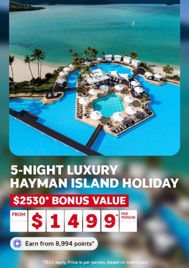 People relaxing in an overwater bungalow plunge pool above turquoise Maldives water for a 7-night 5-star holiday saving $8360 from $399 per person