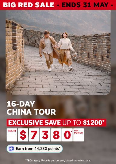Couple walking hand in hand along the Great Wall of China for a Big Red Sale 16-day China tour saving up to $1200 from $7380 per person