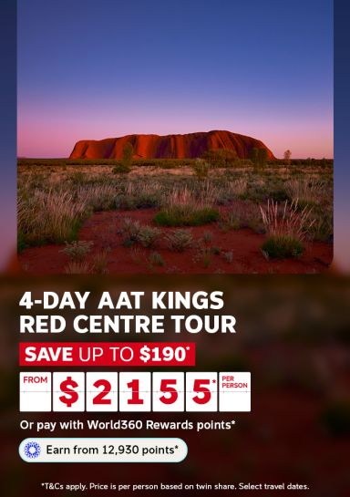 Uluru glowing red at sunset over the outback for a 4-day AAT Kings Red Centre tour saving up to $190 from $2155 per person