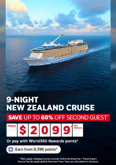 Cruise ship sailing calm waters at dusk for a 9-night New Zealand cruise saving up to 60% off second guest from 2099 per person