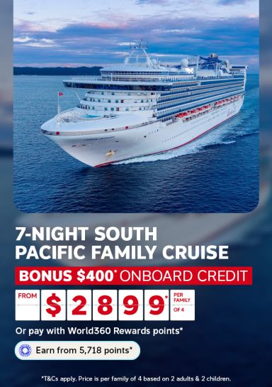 Cruise ship sailing calm waters at dusk for a 7-night South Pacific family cruise with $400 onboard credit from $2899 per family of 4