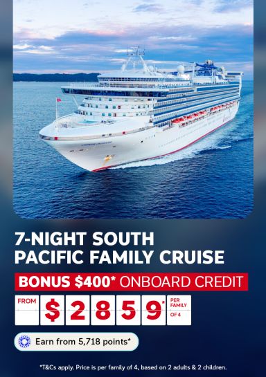 Cruise ship sailing calm waters at dusk for a 7-night South Pacific family cruise with bonus $400 onboard credit from $2859 per family of 4