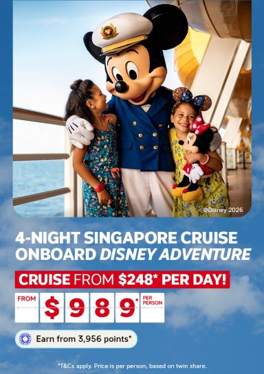 Two children hugging Captain Mickey Mouse on the deck of Disney Adventure for a 4-night Singapore cruise from $989 per person