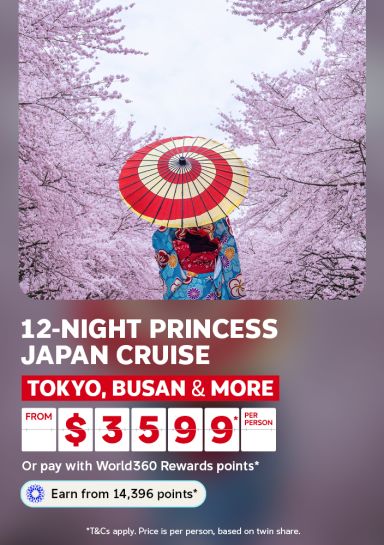 Woman in a kimono holding a red umbrella under cherry blossoms for a 12-night Princess Japan cruise to Tokyo Busan and more from $3599 per person