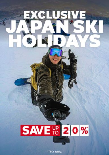 Snowboarder taking a selfie on a snowy mountain slope for exclusive Japan ski holidays saving up to 20%