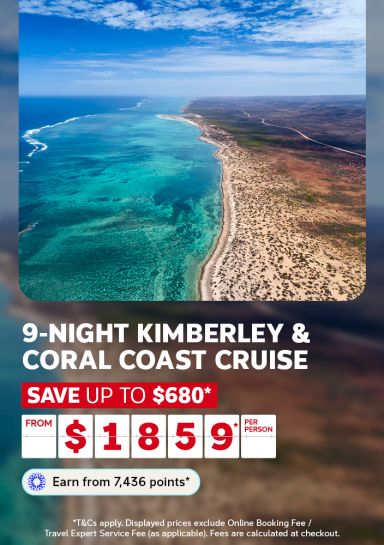 Aerial view of turquoise reef waters meeting rugged red coastline for a 9-night Kimberley and Coral Coast cruise saving up to 680 from 1859 per person