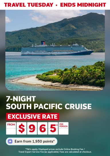 Carnival cruise ship surrounded by tropical islands featuring a 7-night South Pacific cruise from $965